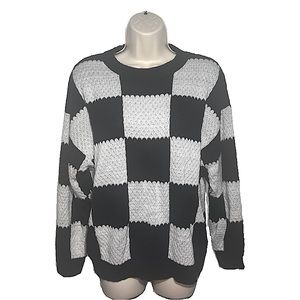 A white and black checkered print made by Wild Fable and is a size M.